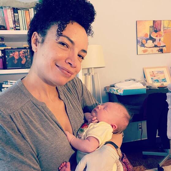 Doula Maiysha with a baby in NYC